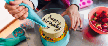 Decorating a birthday cake