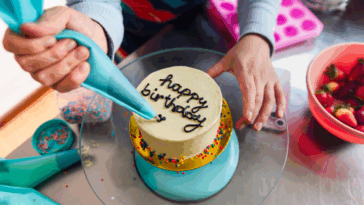 Decorating a birthday cake