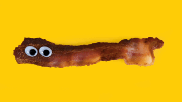 A piece of bacon with googly eyes on it.