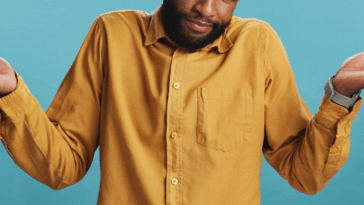 A man shrugging his shoulders.