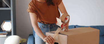 Woman packing boxes