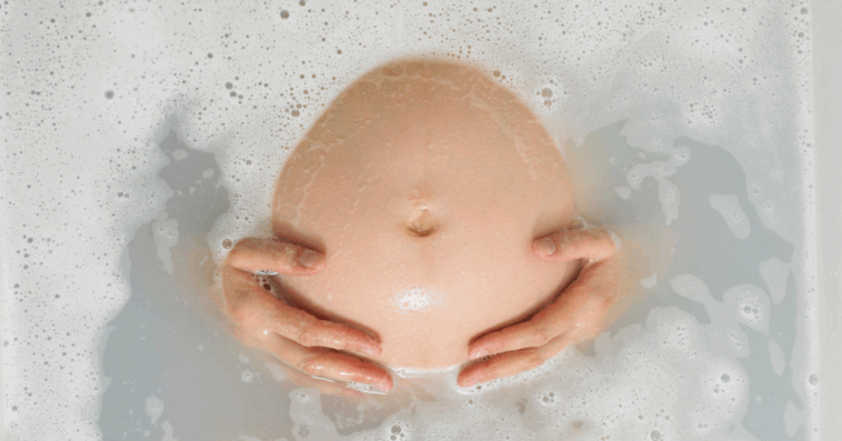 Pregnant woman in bathtub