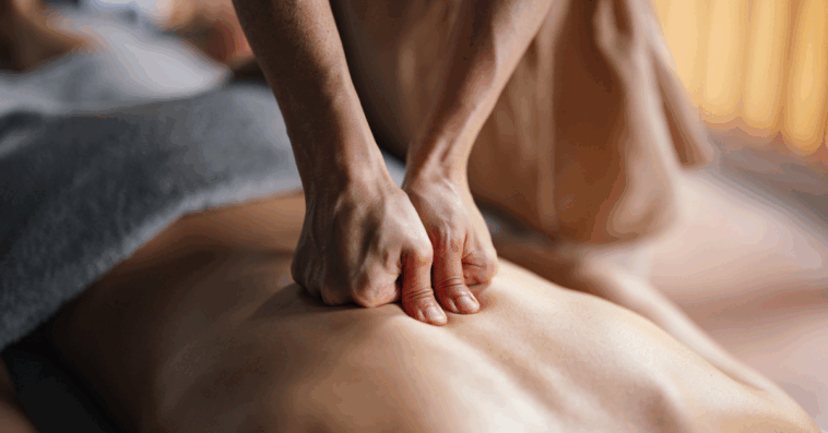 A masseuse giving a massage.