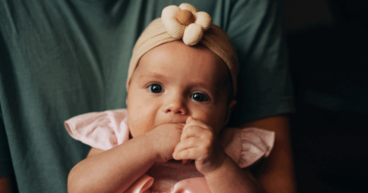 Baby wearing a flower
