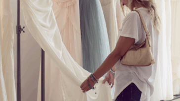 Woman looking at wedding dresses