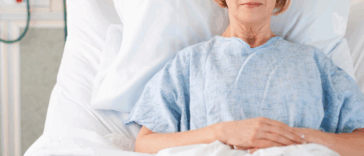 older woman in hospital bed