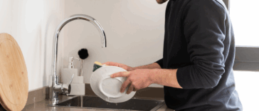 Guy washing dishes
