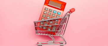 A calculator in a grocery cart.
