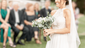bride walking down aisle alone