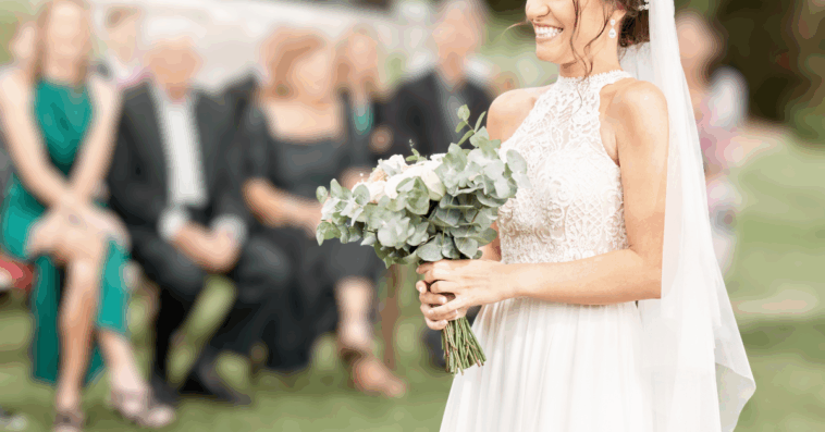 bride walking down aisle alone