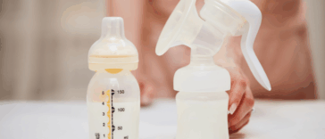 Woman with breast pump and pumping accessories