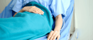 Woman in hospital bed