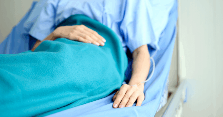 Woman in hospital bed