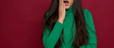 A woman with a shocked expression on her face.