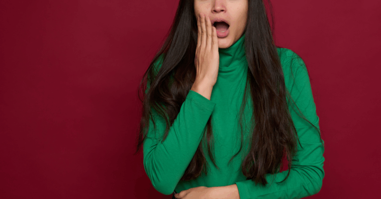A woman with a shocked expression on her face.