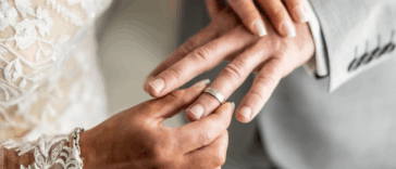 Couple exchanging rings