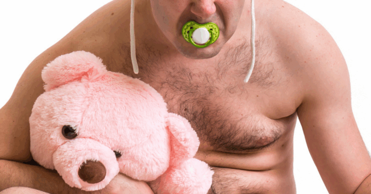 Guy dressed as a baby