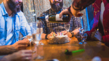 people celebrating birthday in restaurant