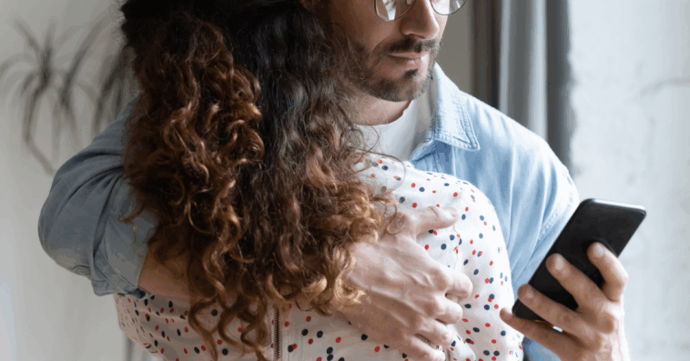 Guy tracking on his phone