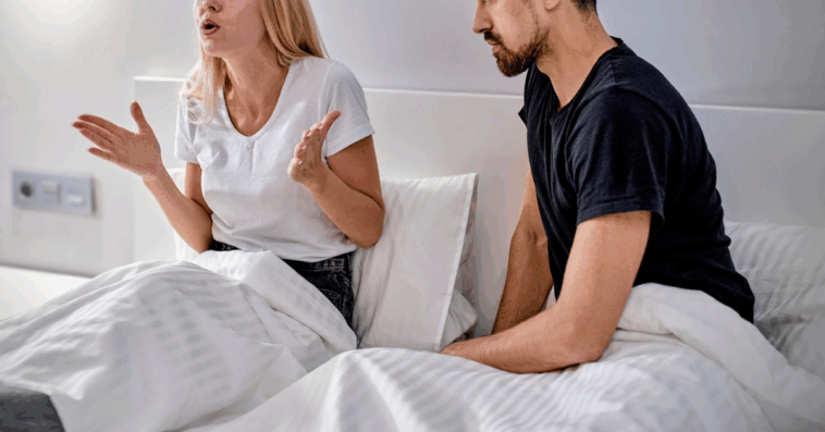 couple argue in bed