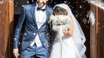 newly married couple leaving church