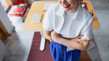 smiling woman standing in office