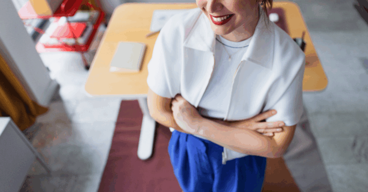 smiling woman standing in office