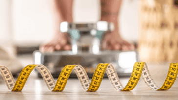 Woman standing on a scale