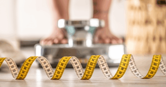 Woman standing on a scale