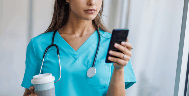 Doctor looking at her phone