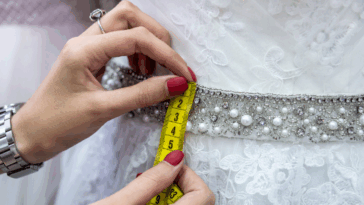 Woman measuring a dress