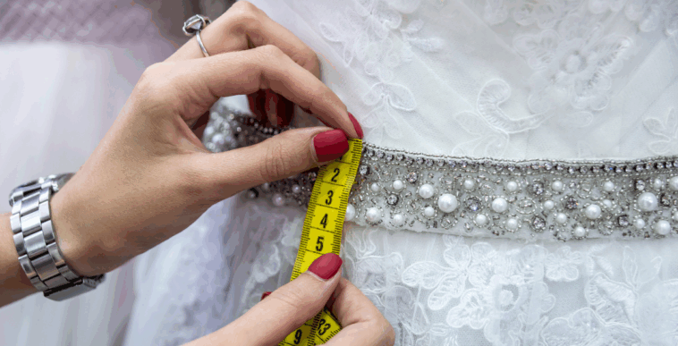Woman measuring a dress