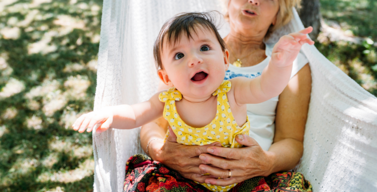 grandmother and granddaughter in hammock