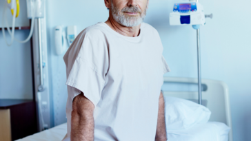 Man in hospital bed