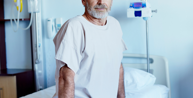Man in hospital bed