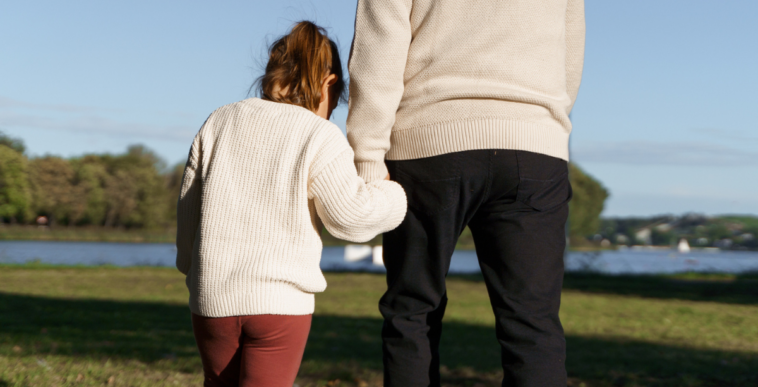 Young girl with guardian