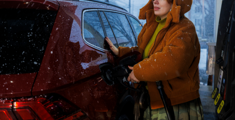 woman pumping gas
