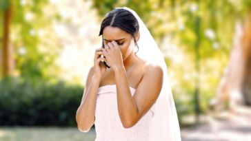 crying bride speaking on phone