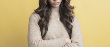 young woman with crossed arms