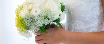 A bride holding a bouquet.