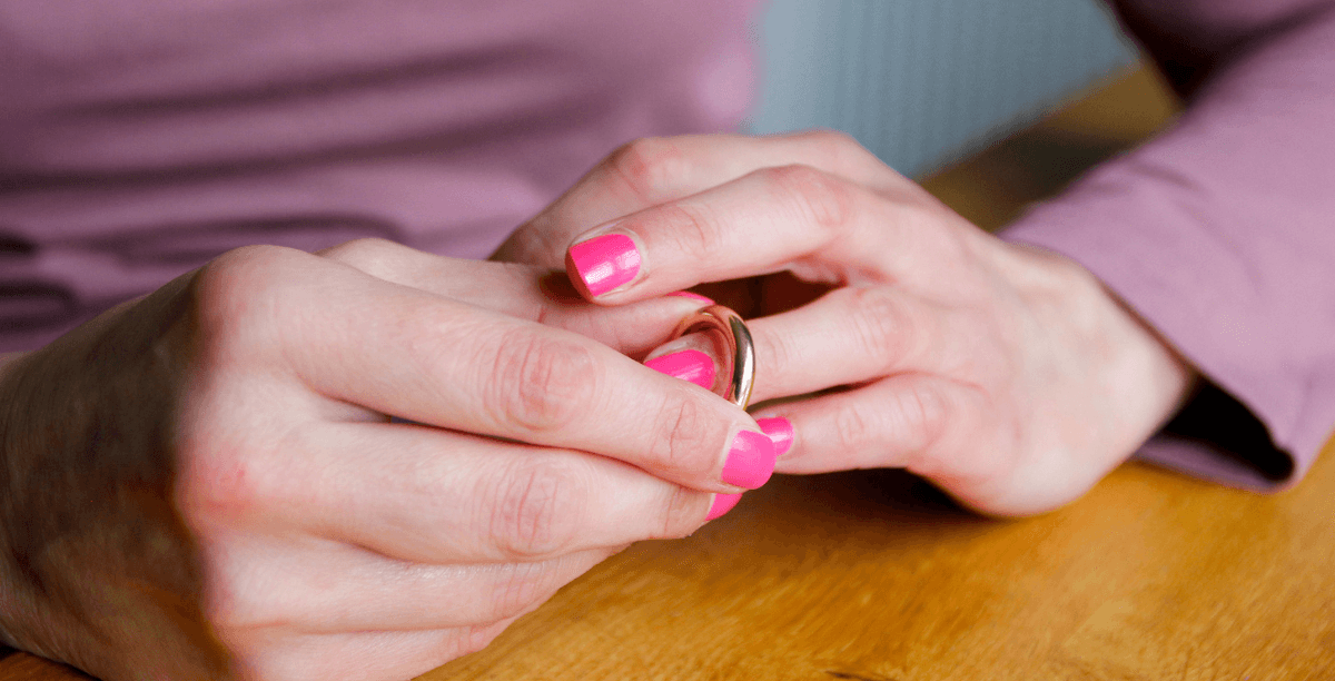 Woman removing her wedding ring