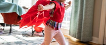 Child playing in homemade costume.