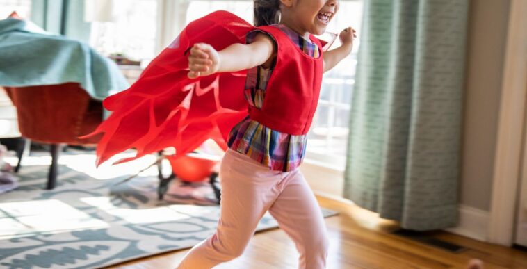 Child playing in homemade costume.