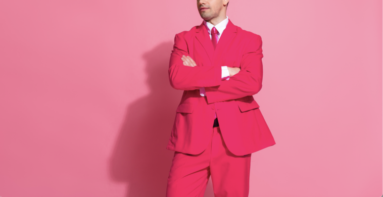 A man in a pink suit.