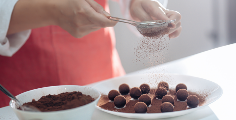 woman making homemade chocolate truffles