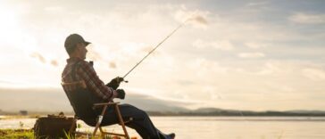Man on a fishing trip by the lake.