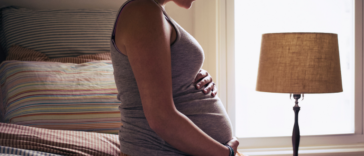 Pregnant woman in bed