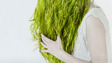 Woman with green hair