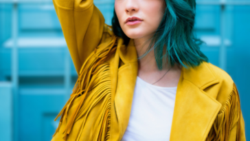 young woman with green hair