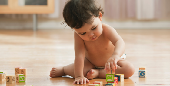 baby playing with blocks